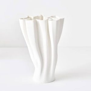 White textured ceramic vase on white background