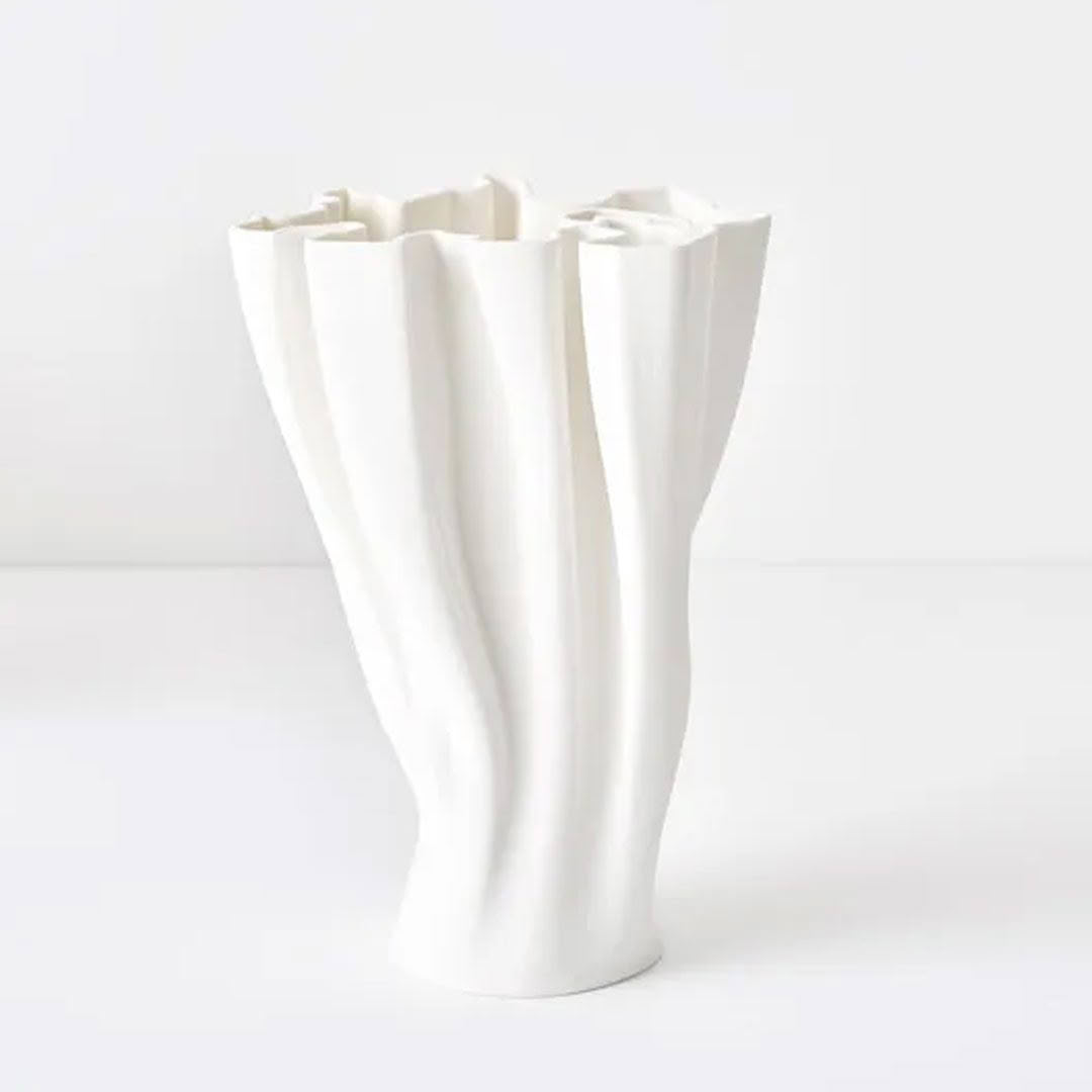 White textured ceramic vase on white background