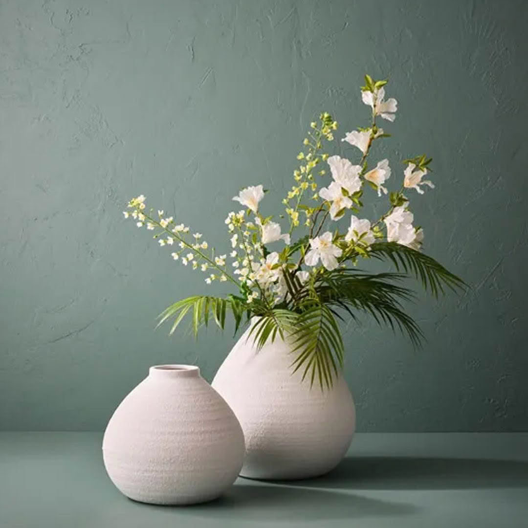 Vase-Mason_medium_2 White vases with fresh flowers on green background