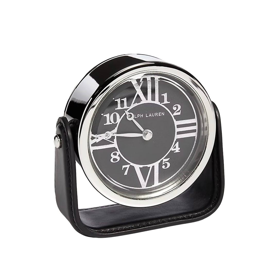 Black folding travel clock with Roman numerals