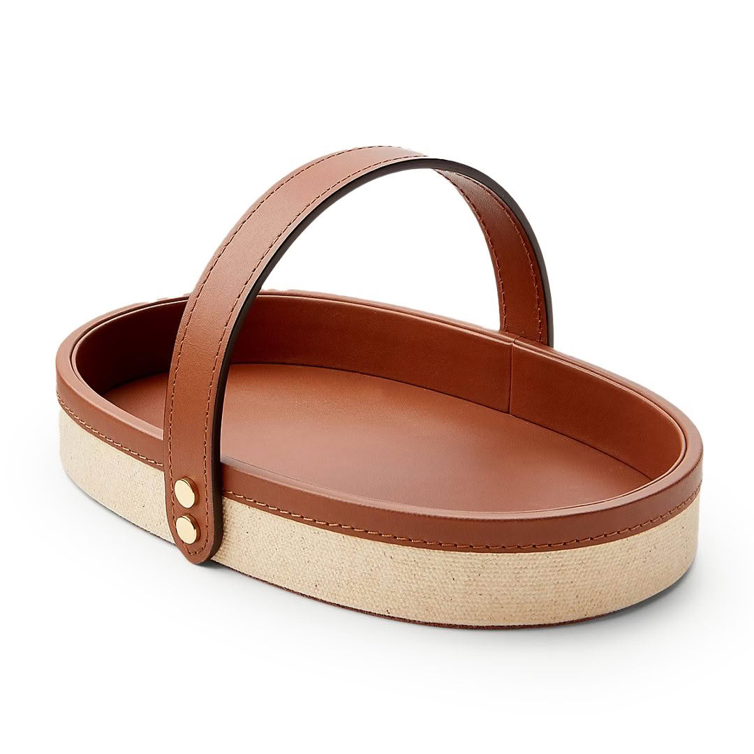 Tan leather and burlap basket with handle