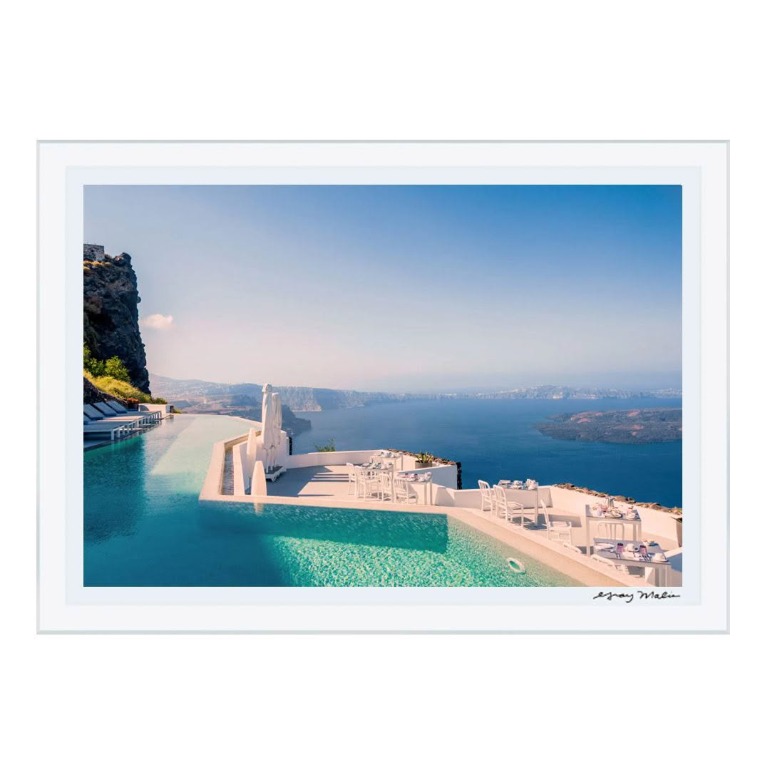 Scenic cliffside pool overlooking ocean in Santorini