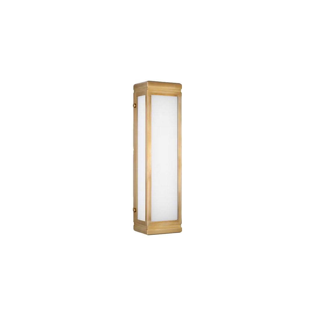 Brass vertical wall sconce with frosted glass
