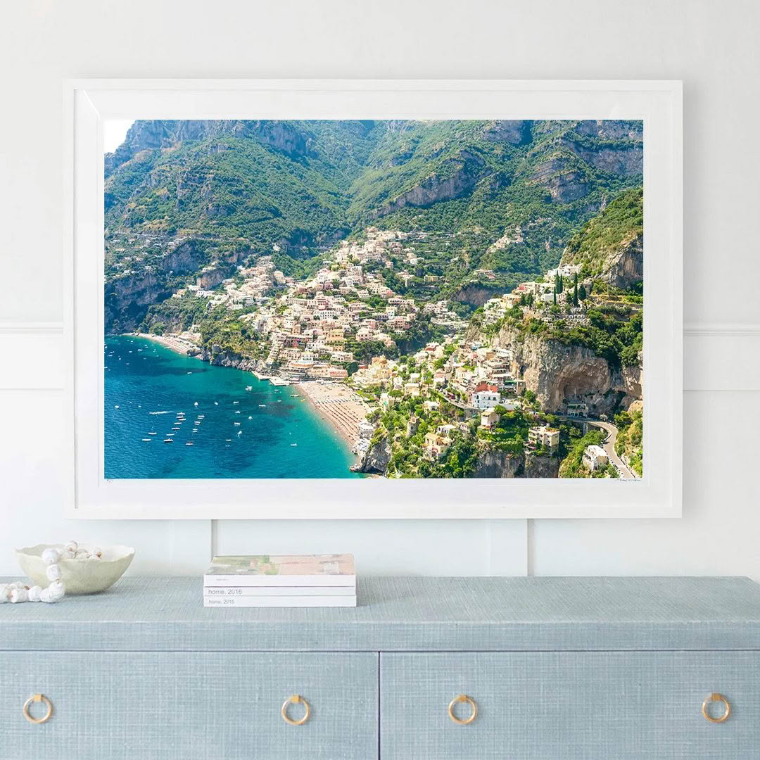Framed aerial view of coastal town and turquoise sea