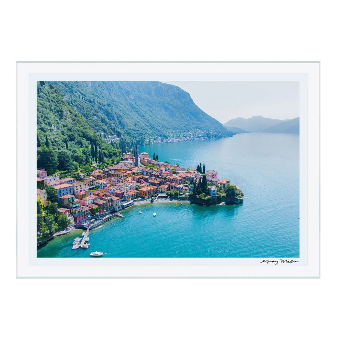 Aerial view of colorful coastal village by lake