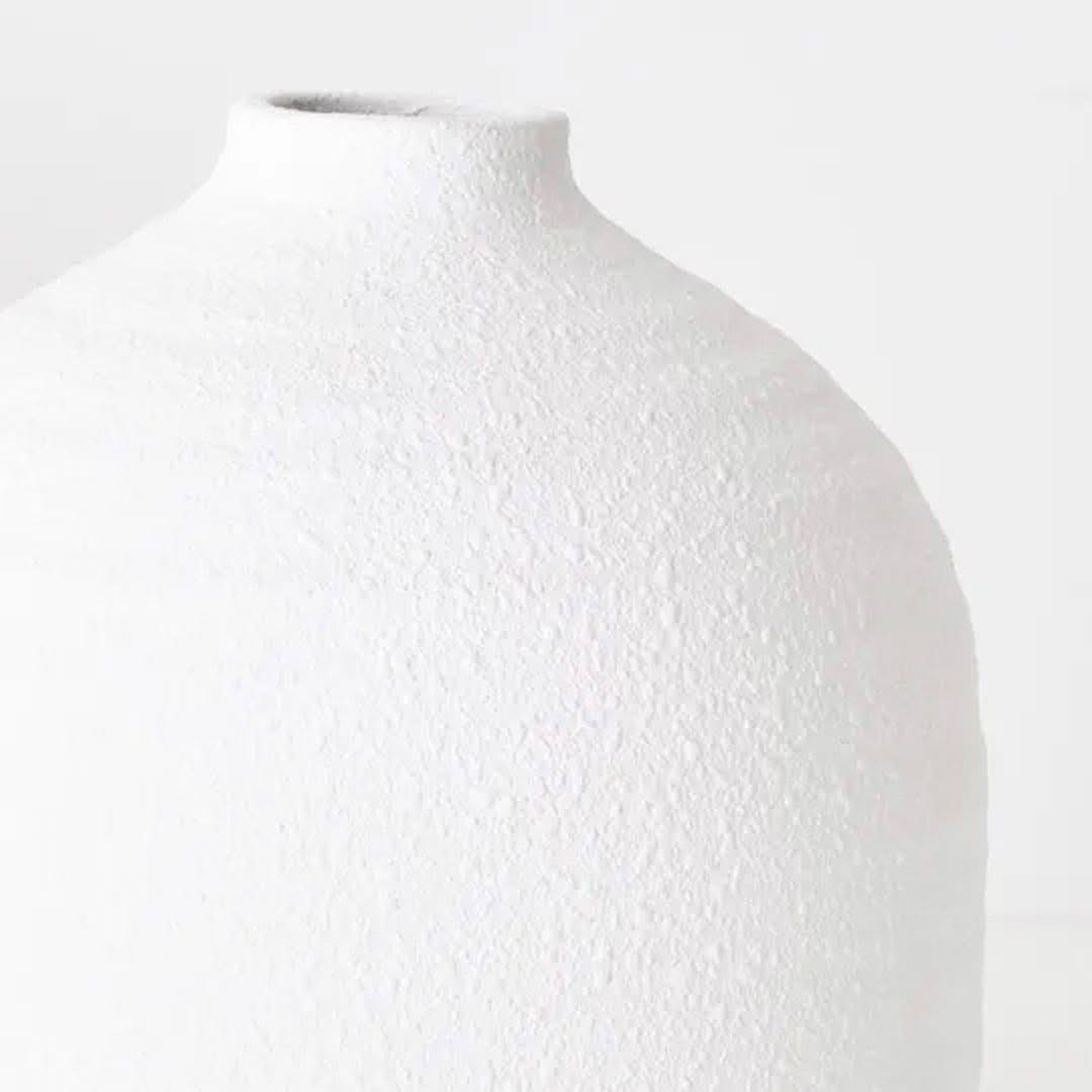 White textured ceramic vase close-up