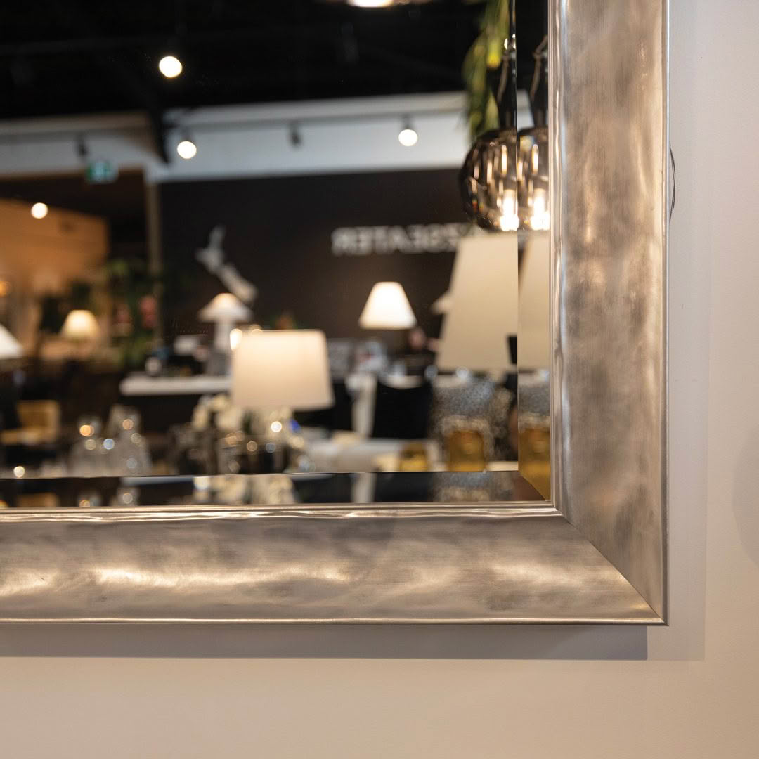 Elegant interior design store display reflected in mirror