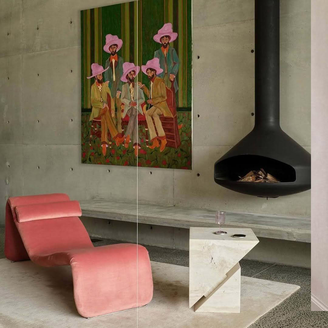 Contemporary room with large vibrant painting and stylish furniture