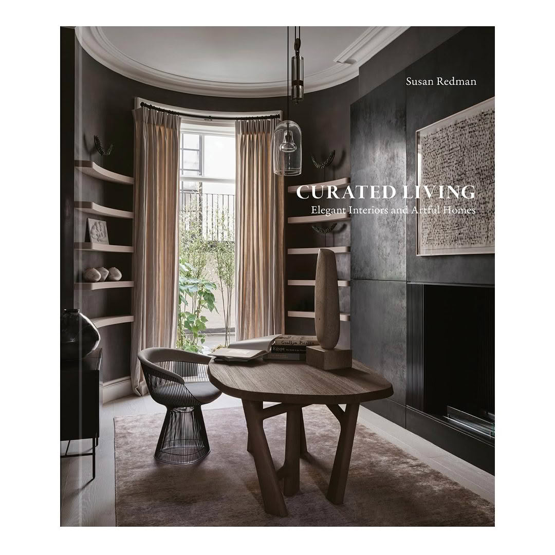 Elegant interior design book cover with styled room