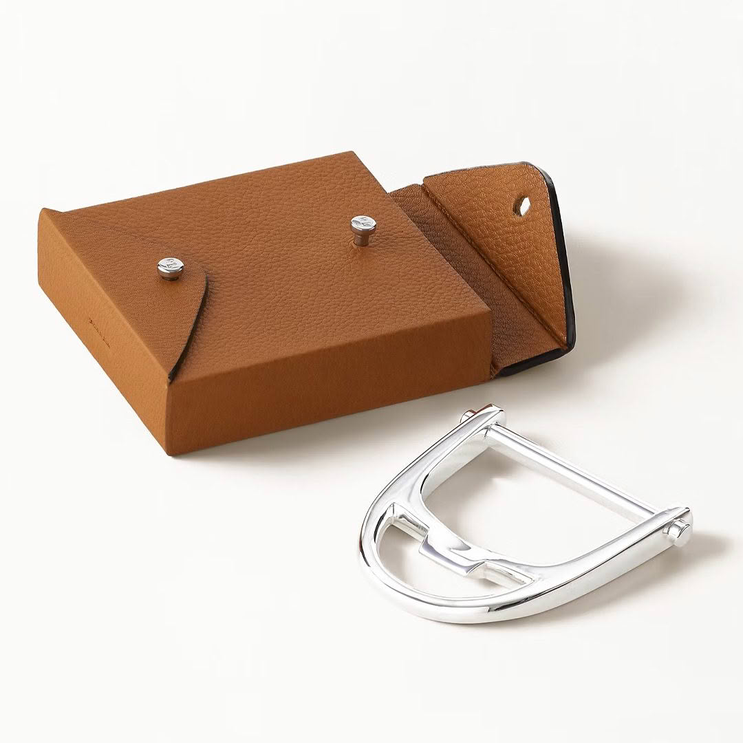 Leather belt packaging with silver buckle