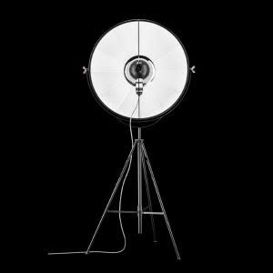 Professional studio light on tripod against black background