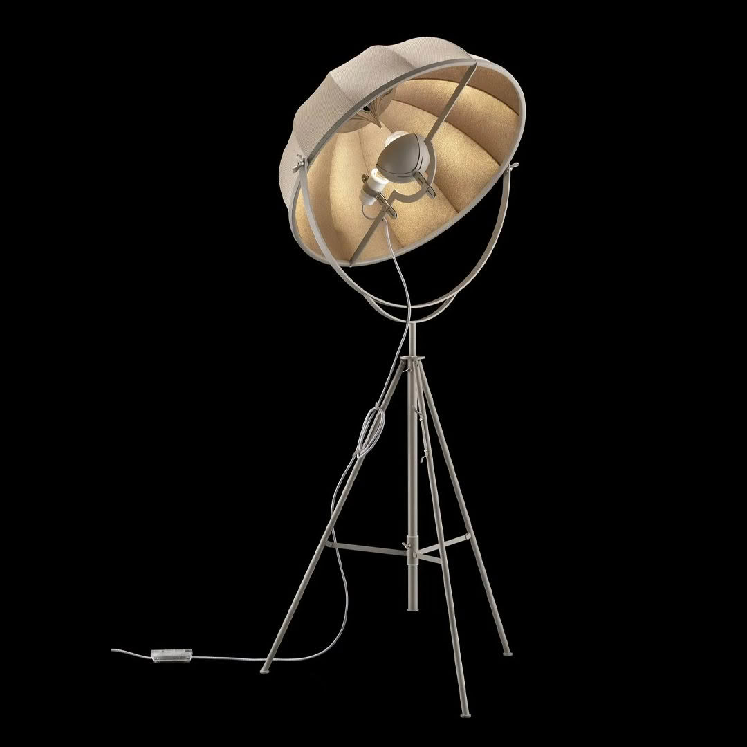 Vintage-style studio floor lamp on black background