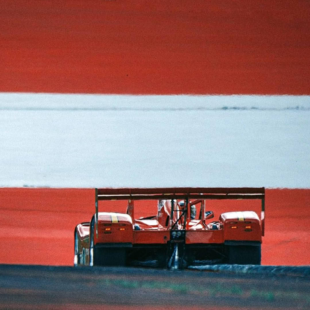 Red tractor on vibrant abstract background