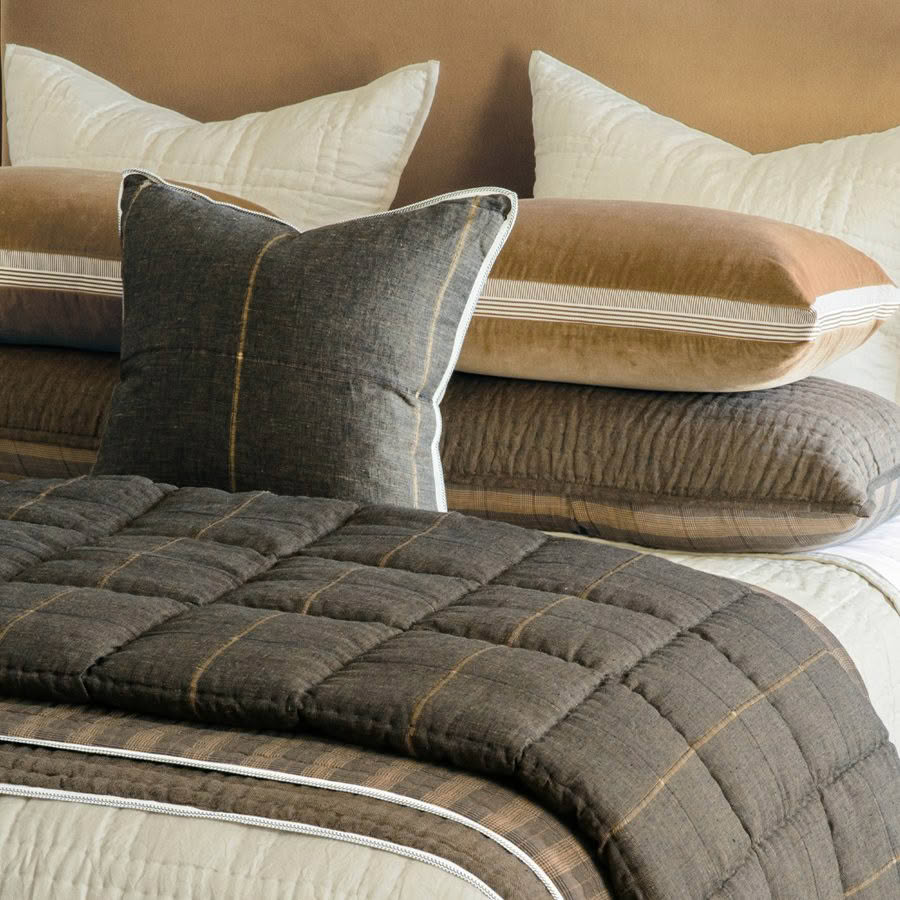 Elegant coordinated bedding with pillows and quilt
