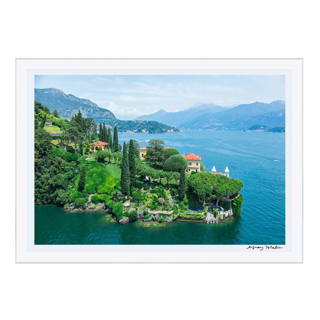 Aerial view of scenic peninsula with villas and gardens