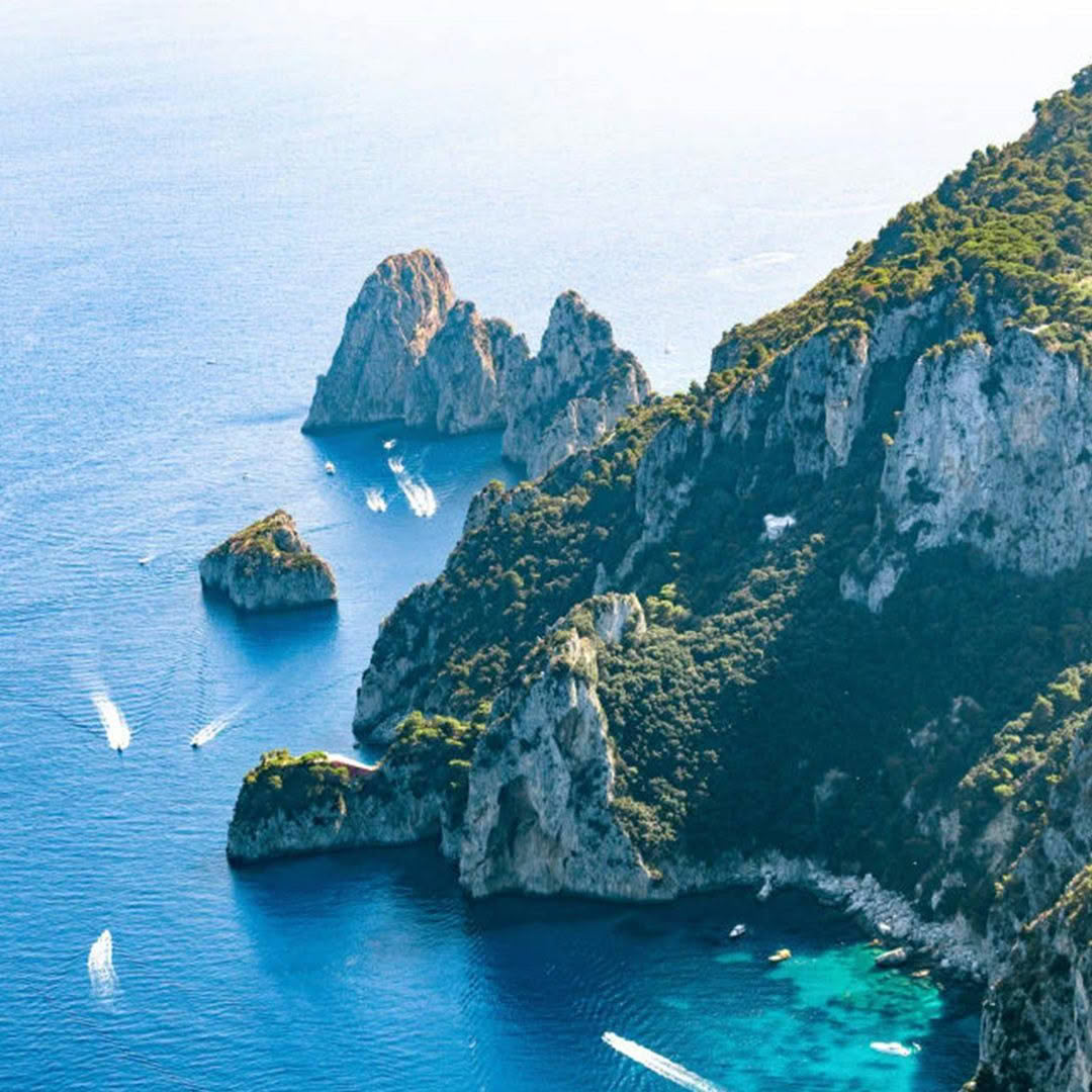 Aerial view of rugged coastline with turquoise waters
