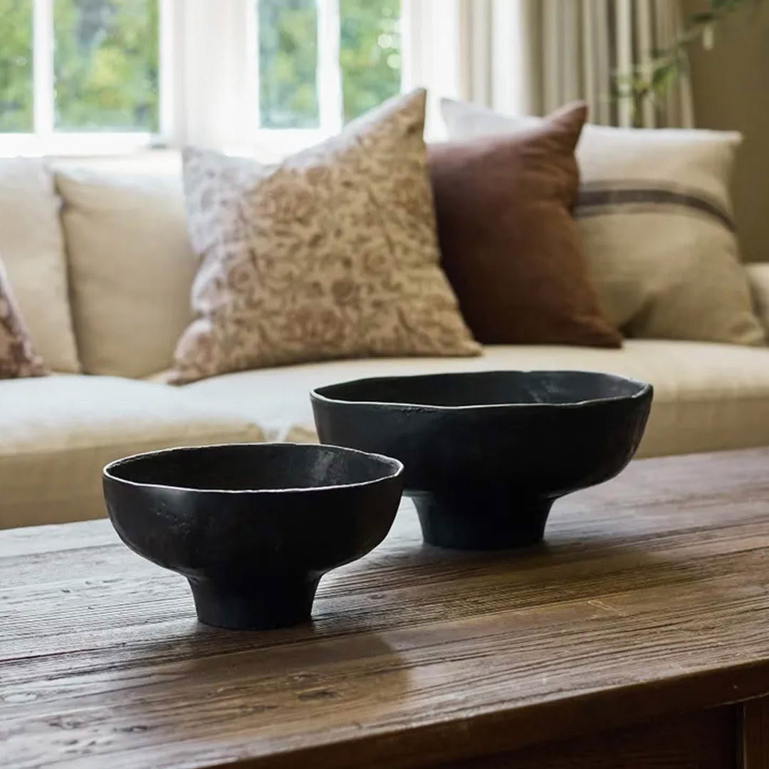Cozy living room with decorative black bowls on table