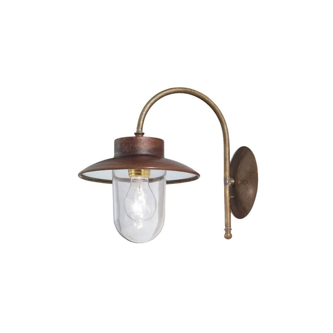 Antique brass wall sconce with glass shade