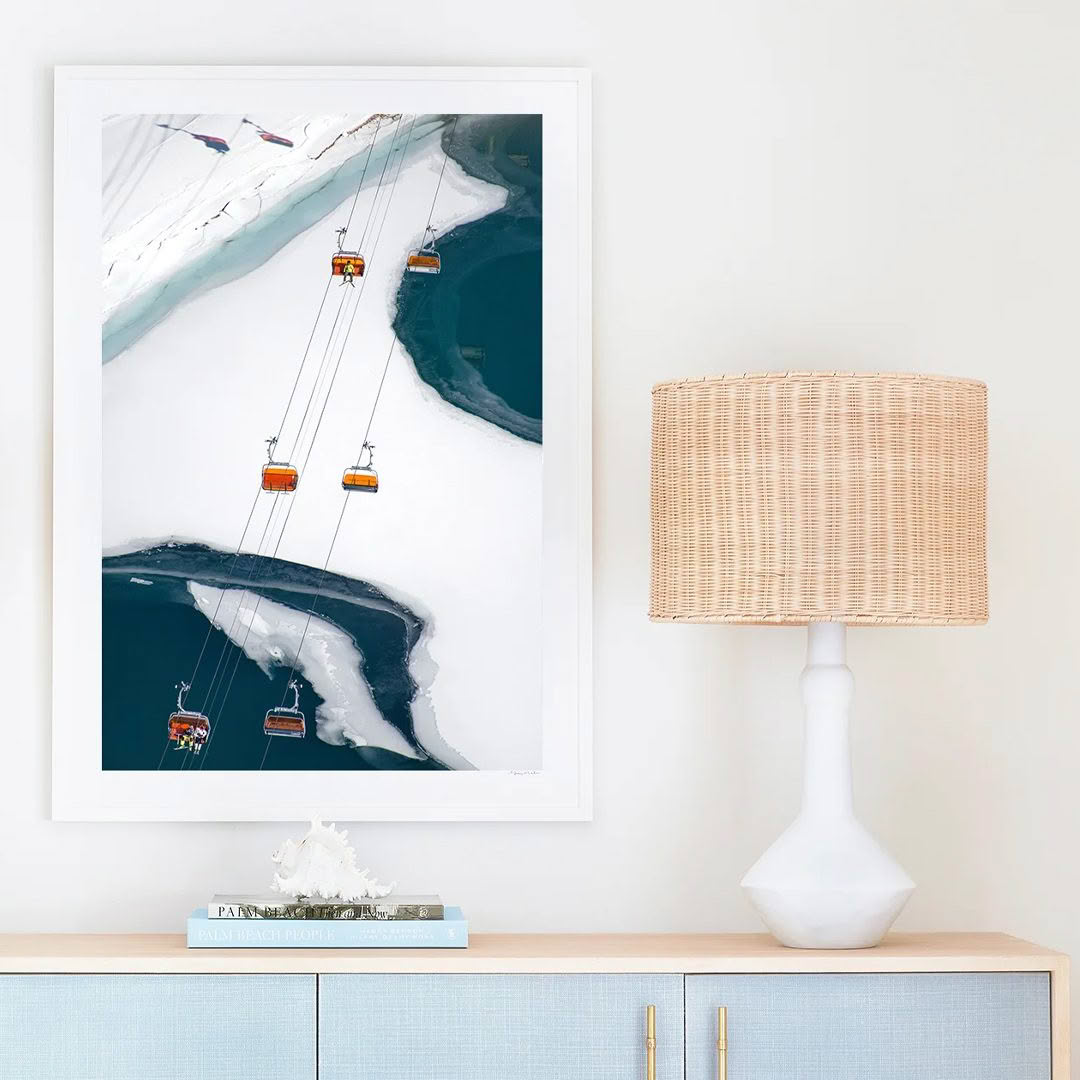 Aerial view of cable cars over snowy river