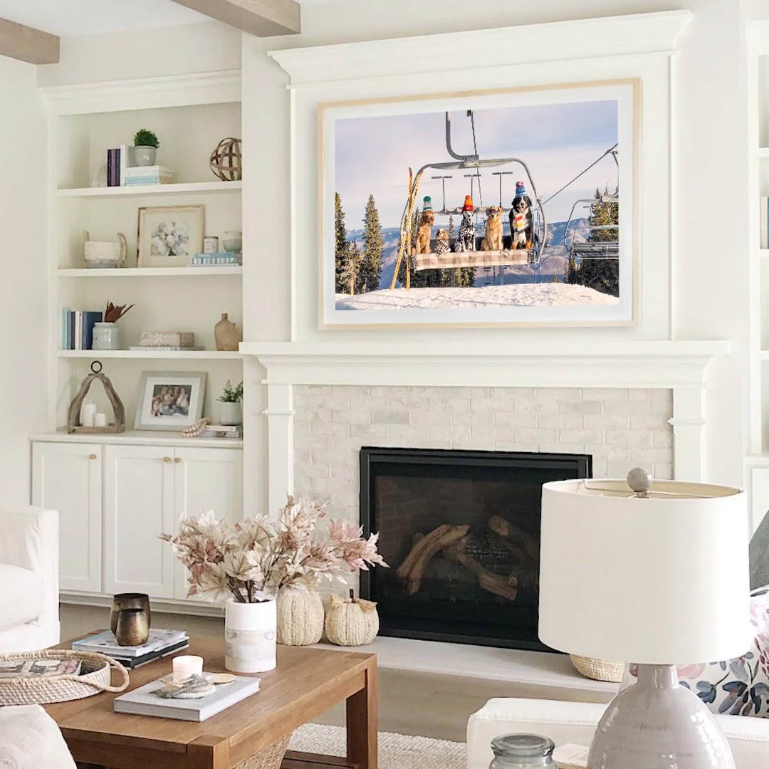 Cozy living room with ski lift photo above fireplace