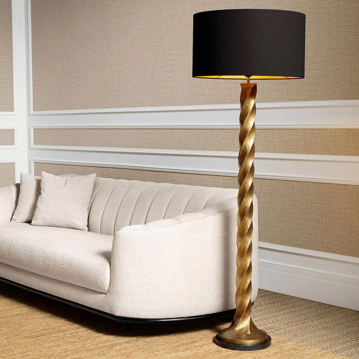 Elegant twisted floor lamp beside modern beige sofa