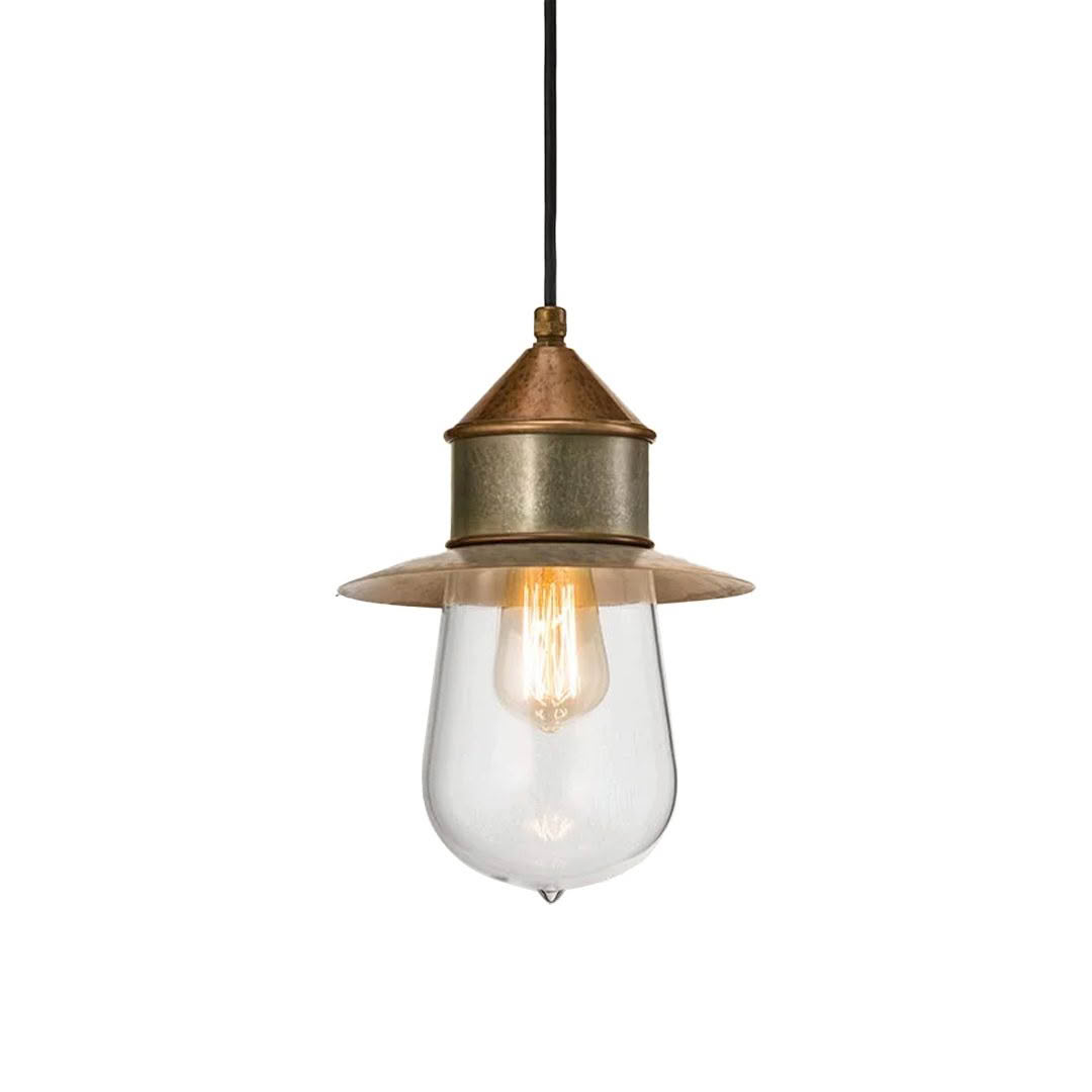 Vintage copper pendant light with glowing filament bulb