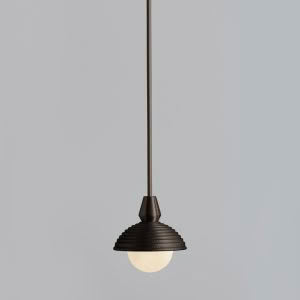 Minimalist black pendant light against gray background