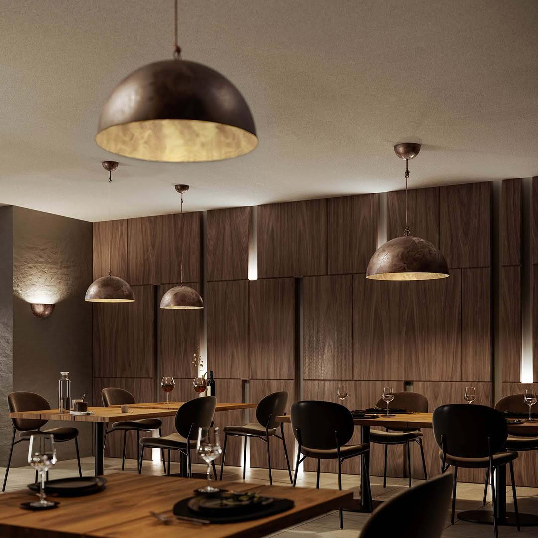 Elegant dining room with wooden walls and modern pendant lights