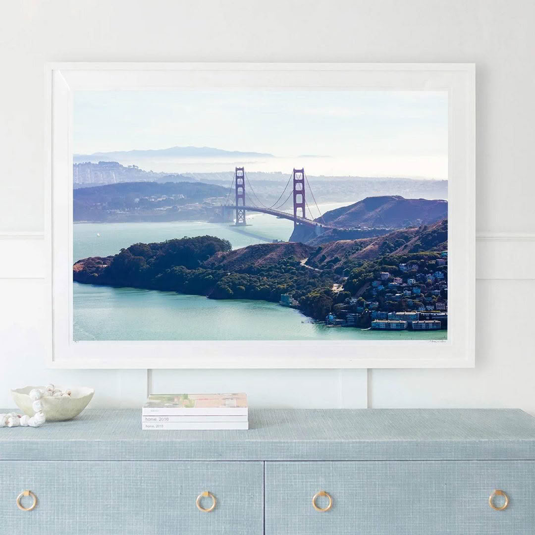 Golden Gate Bridge in framed artwork above cabinet