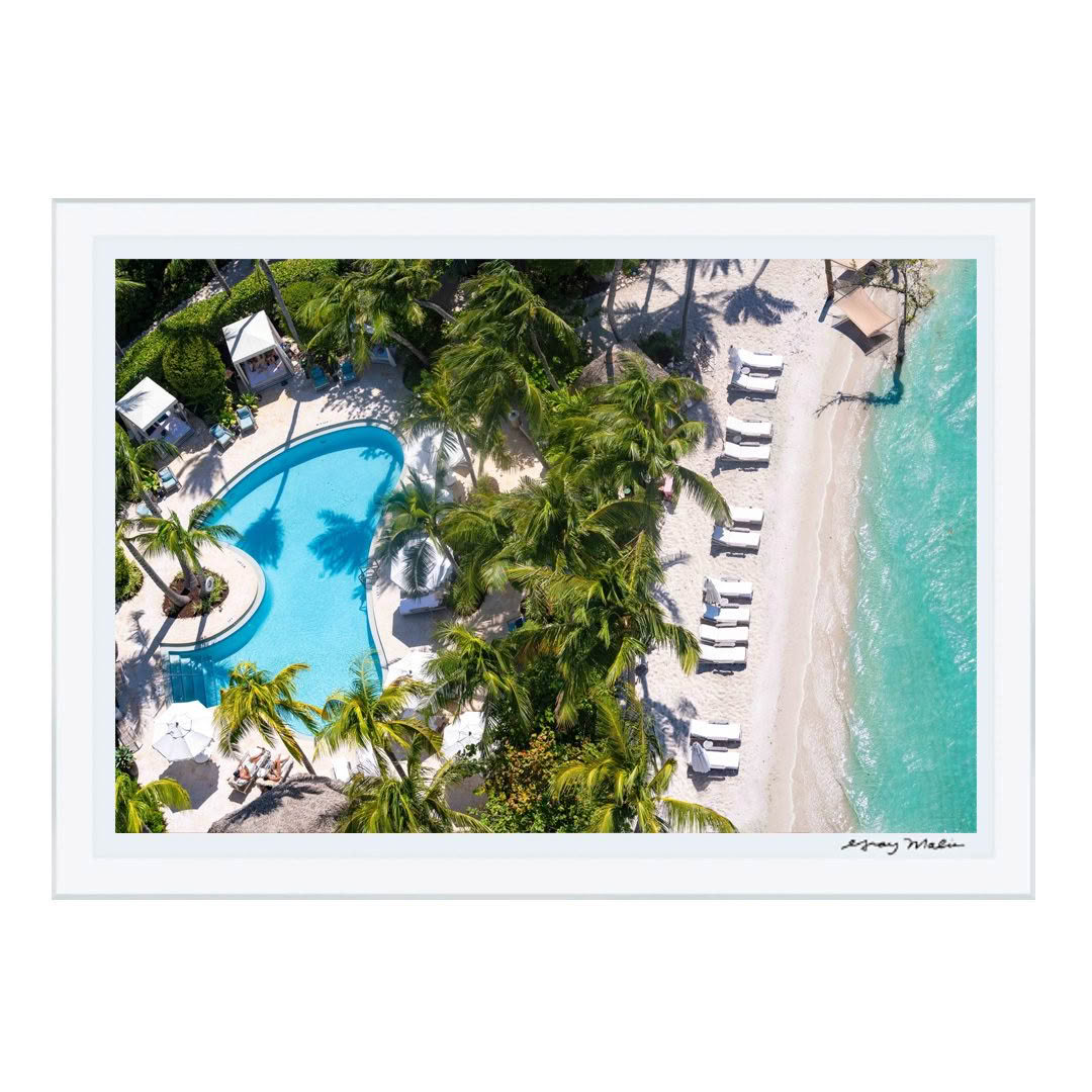 Aerial view of tropical beach resort with pool