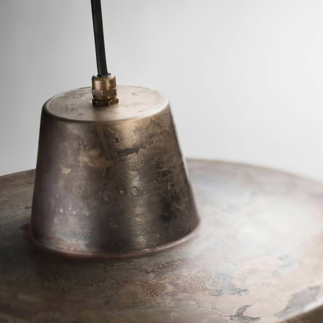 Close-up of worn brass cymbal bell