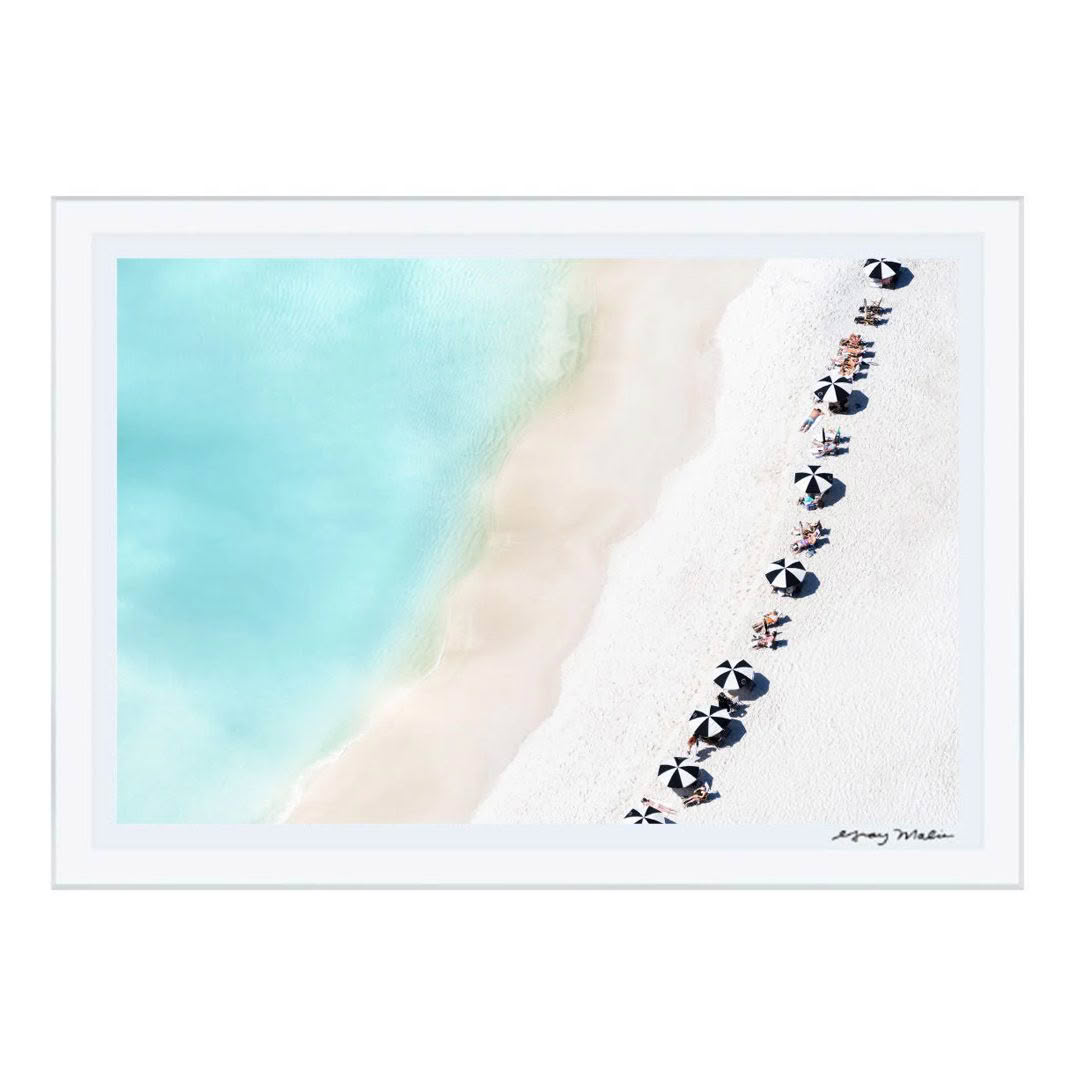 Aerial view of people relaxing on sandy beach