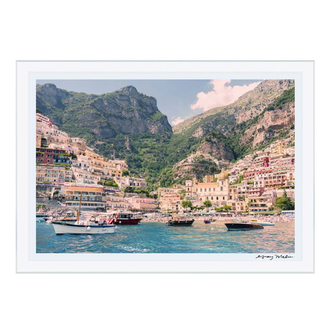 Positano coast with colorful buildings and boats
