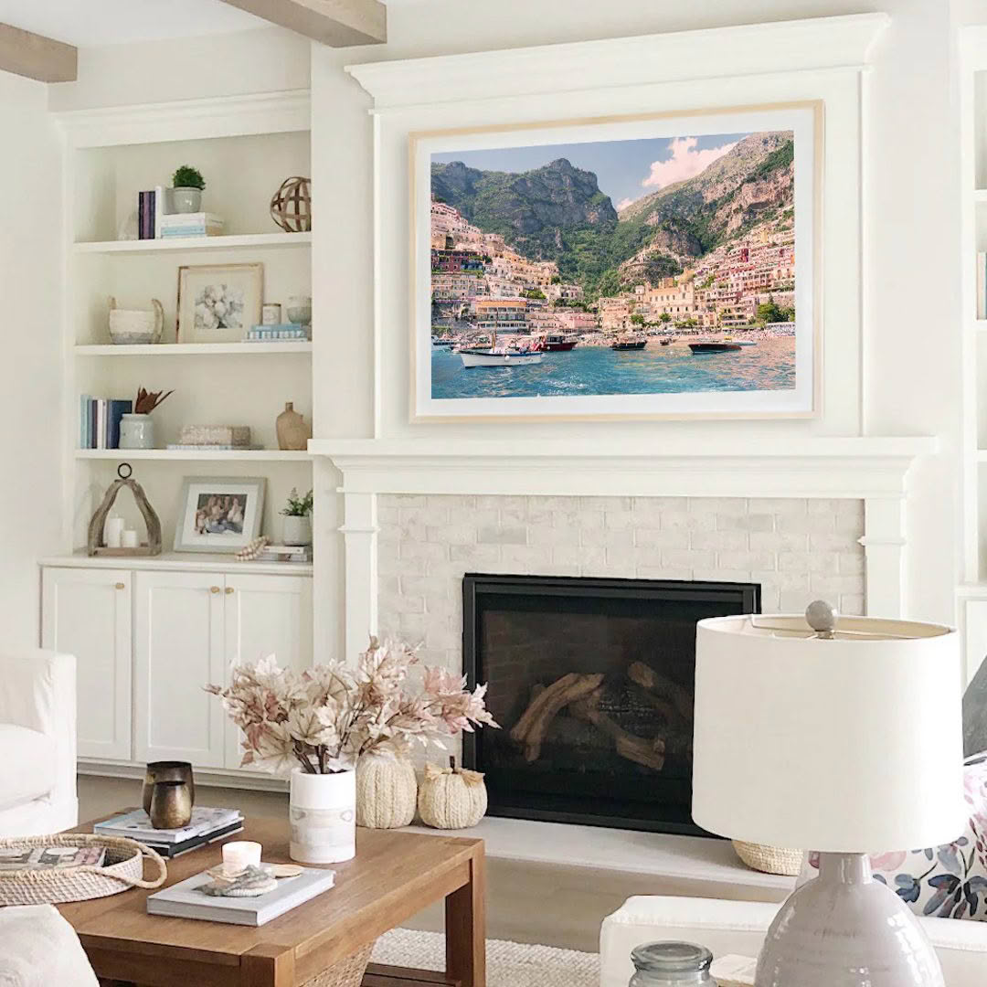 Cozy living room with ocean-themed framed artwork