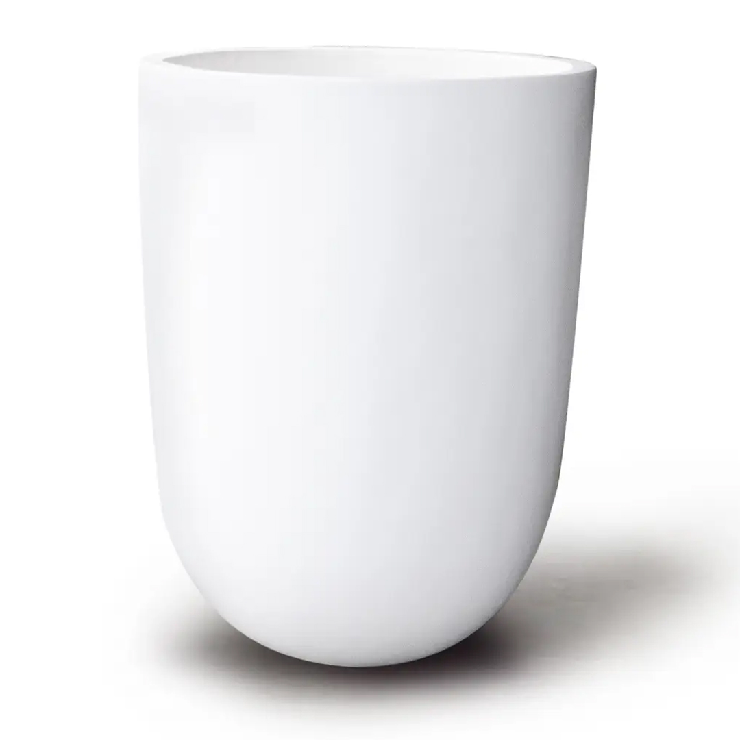 White ceramic mug on white background