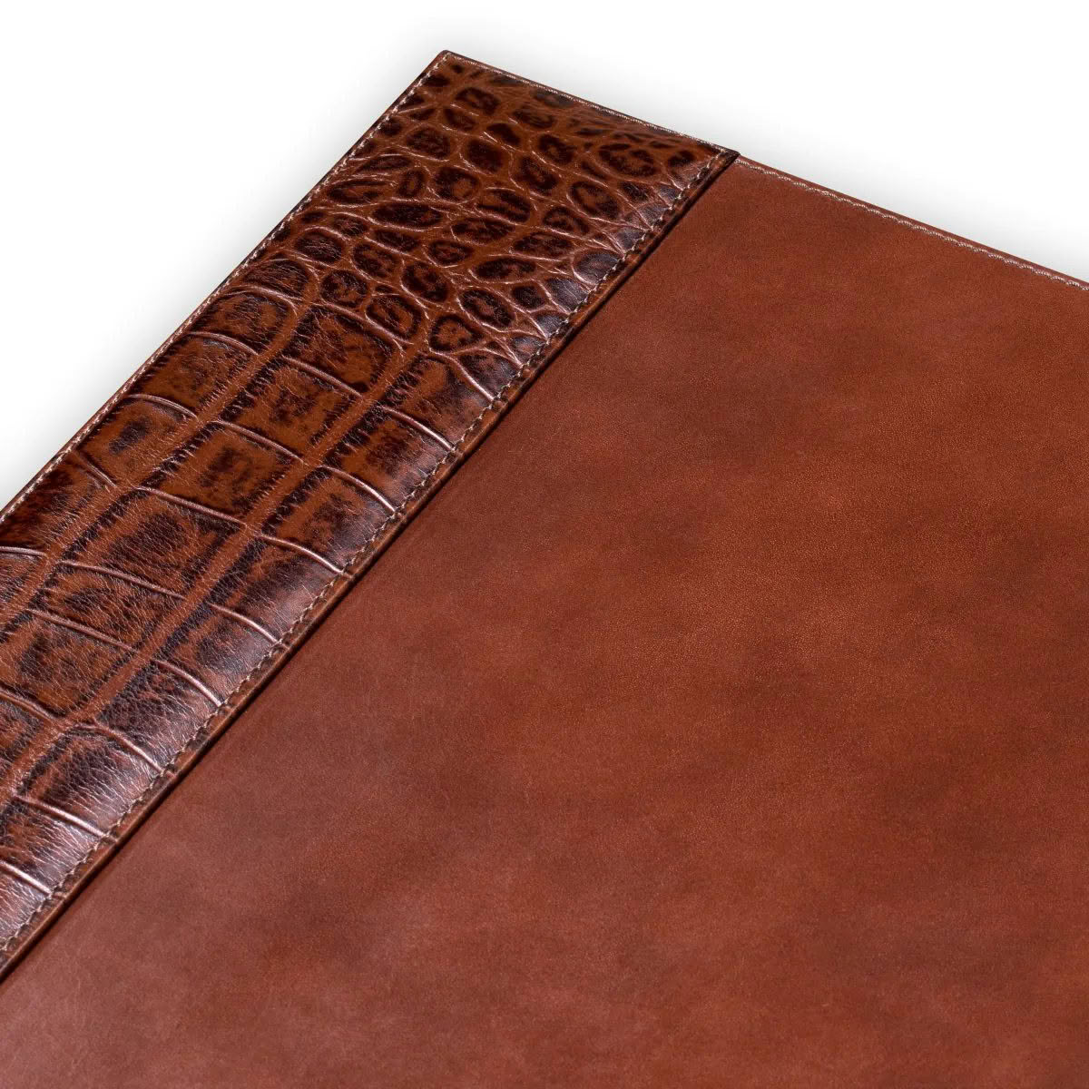 Close-up of brown leather with crocodile pattern detail