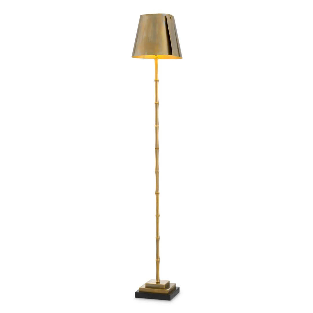 Gold bamboo-style floor lamp with shaded light