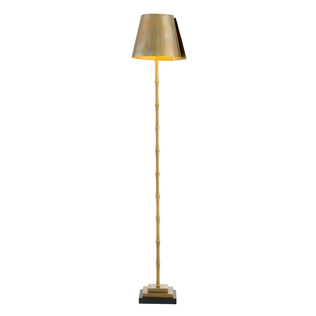 Tall gold bamboo-shaped floor lamp with lampshade