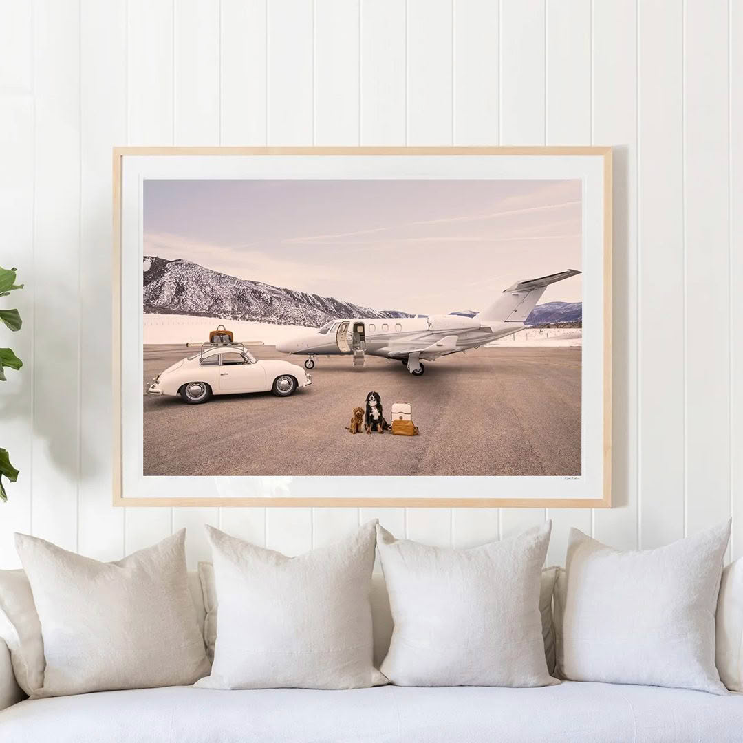 Framed photo of vintage car and jet on runway