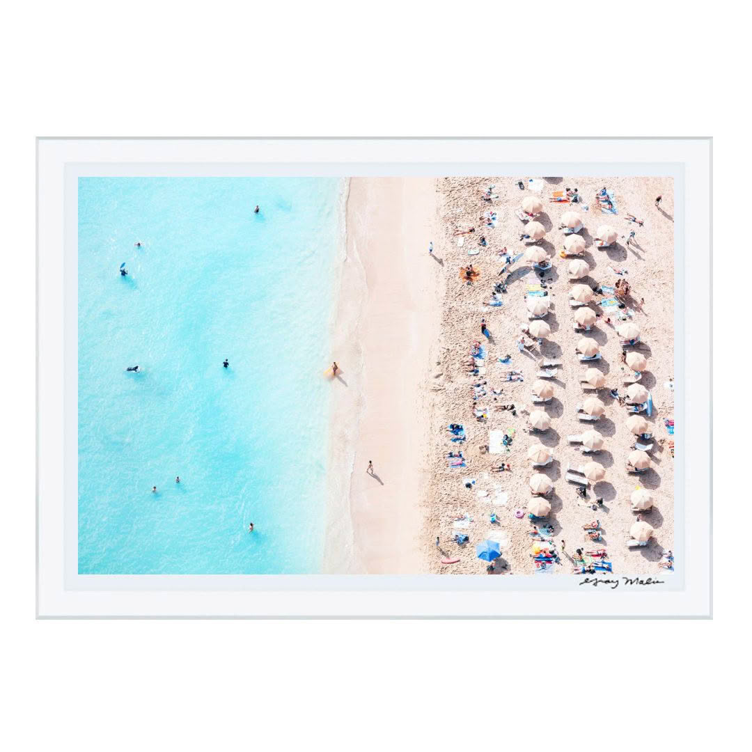 Aerial view of crowded beach with turquoise water