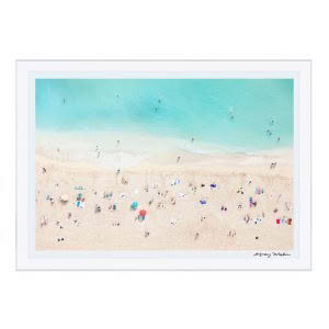 Aerial view of crowded beach with turquoise water