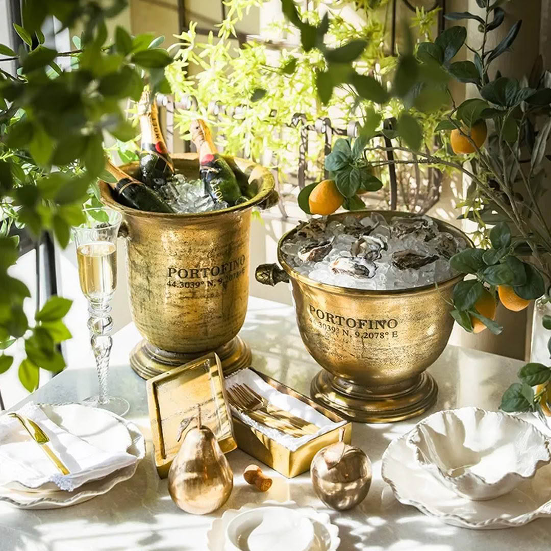 Elegant outdoor table setting with champagne on ice