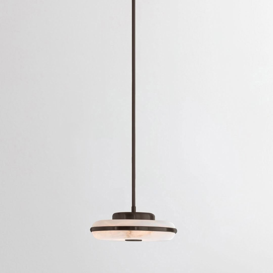 Modern circular pendant light on white background