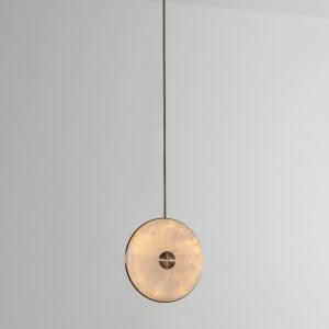 Modern circular pendant light with golden hue