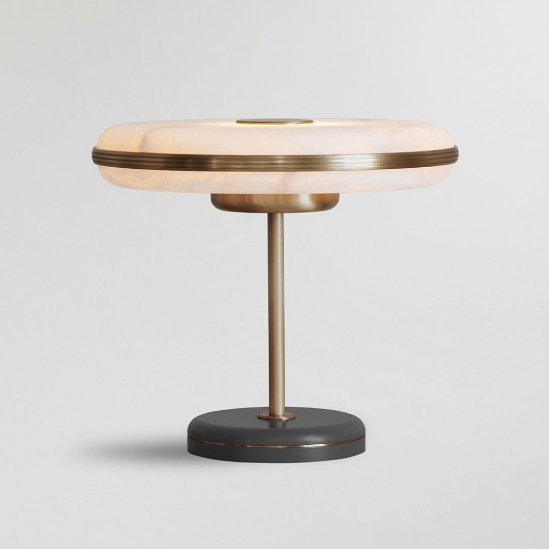 Elegant modern copper table lamp on gray background