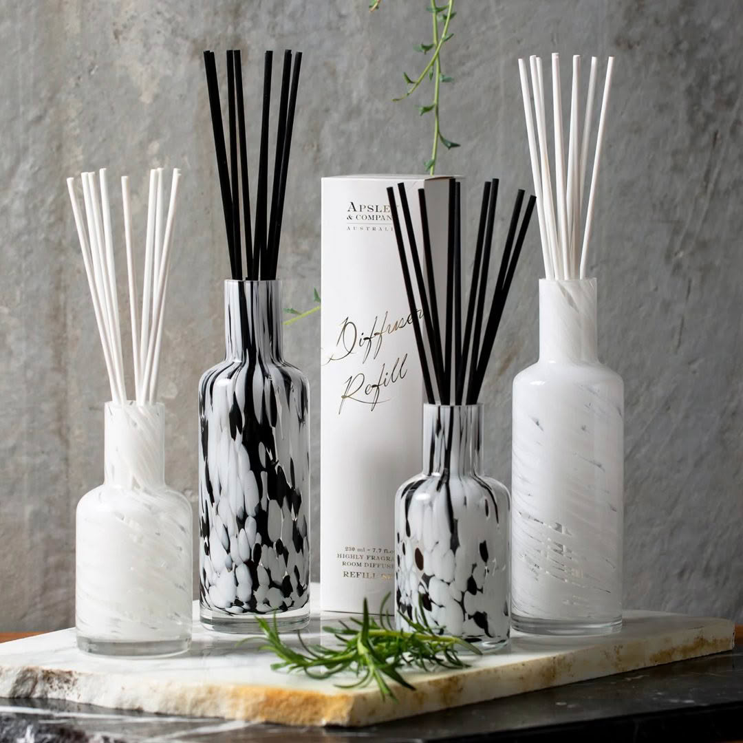 Assorted stylish aroma diffuser bottles with reeds