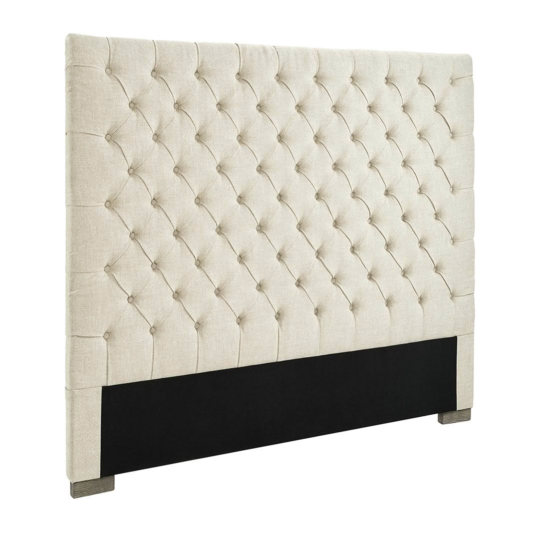 Beige tufted headboard with diamond pattern