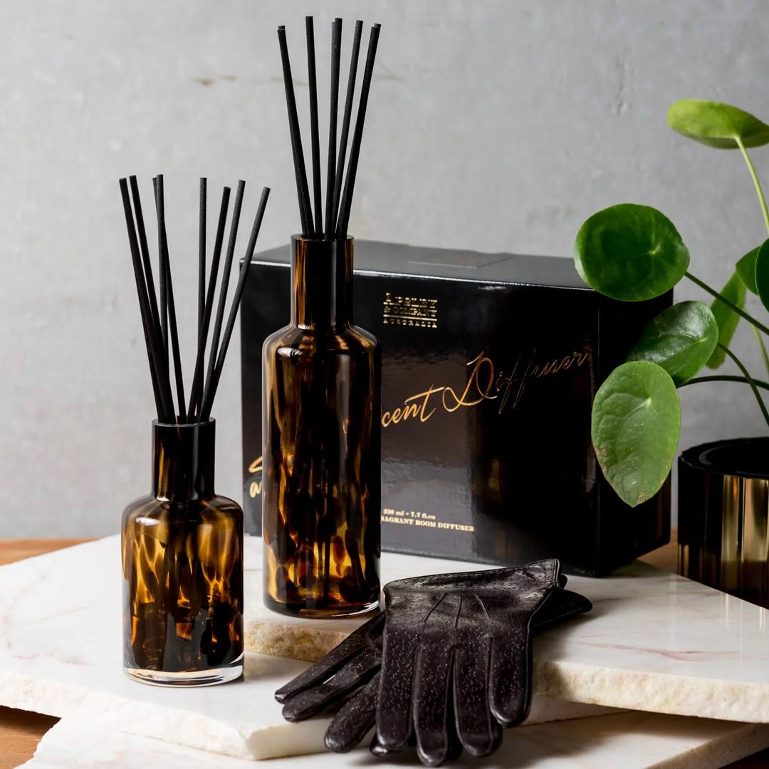 Elegant amber scent diffusers with decorative black reeds