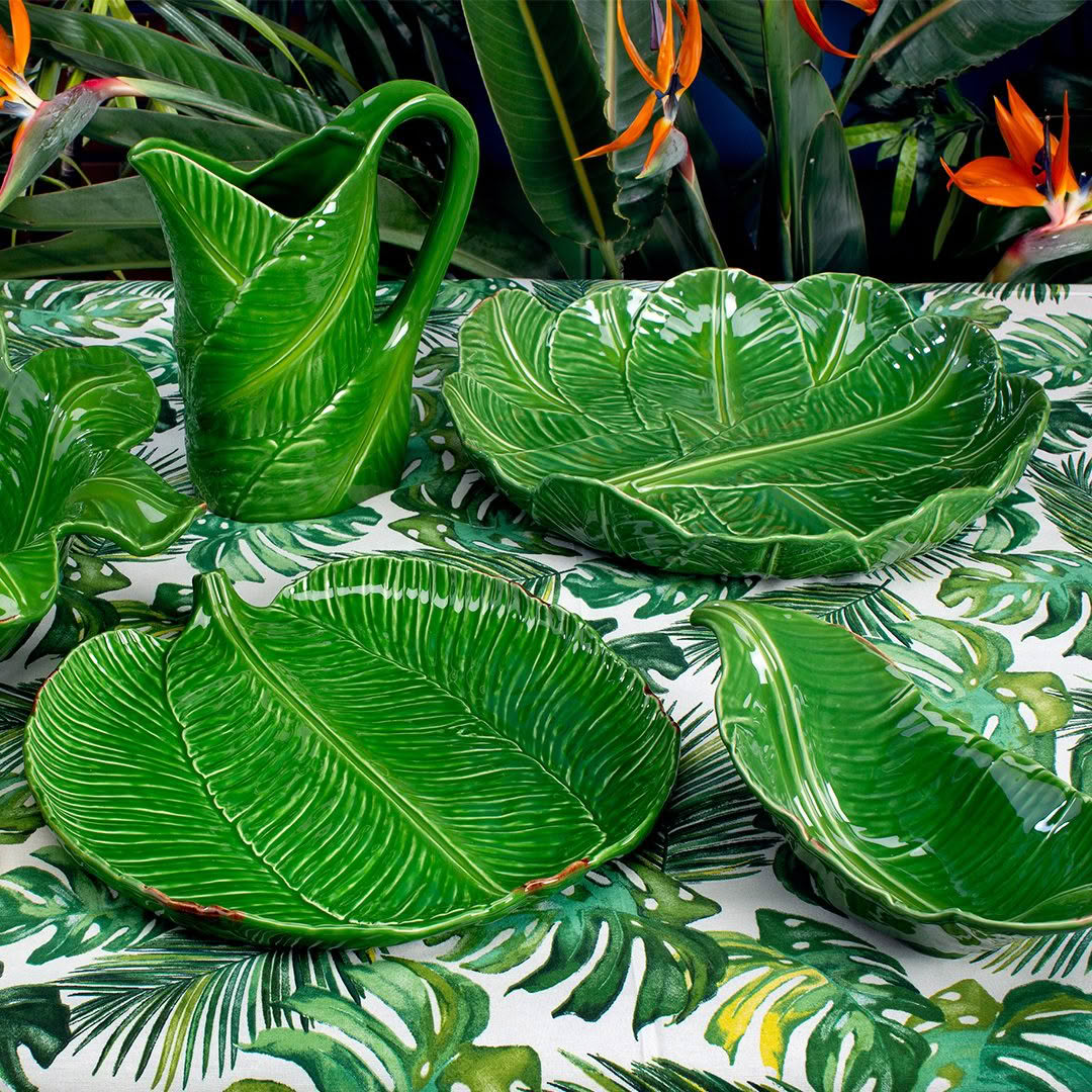 Ceramic leaf-shaped dishes and jug on tropical pattern
