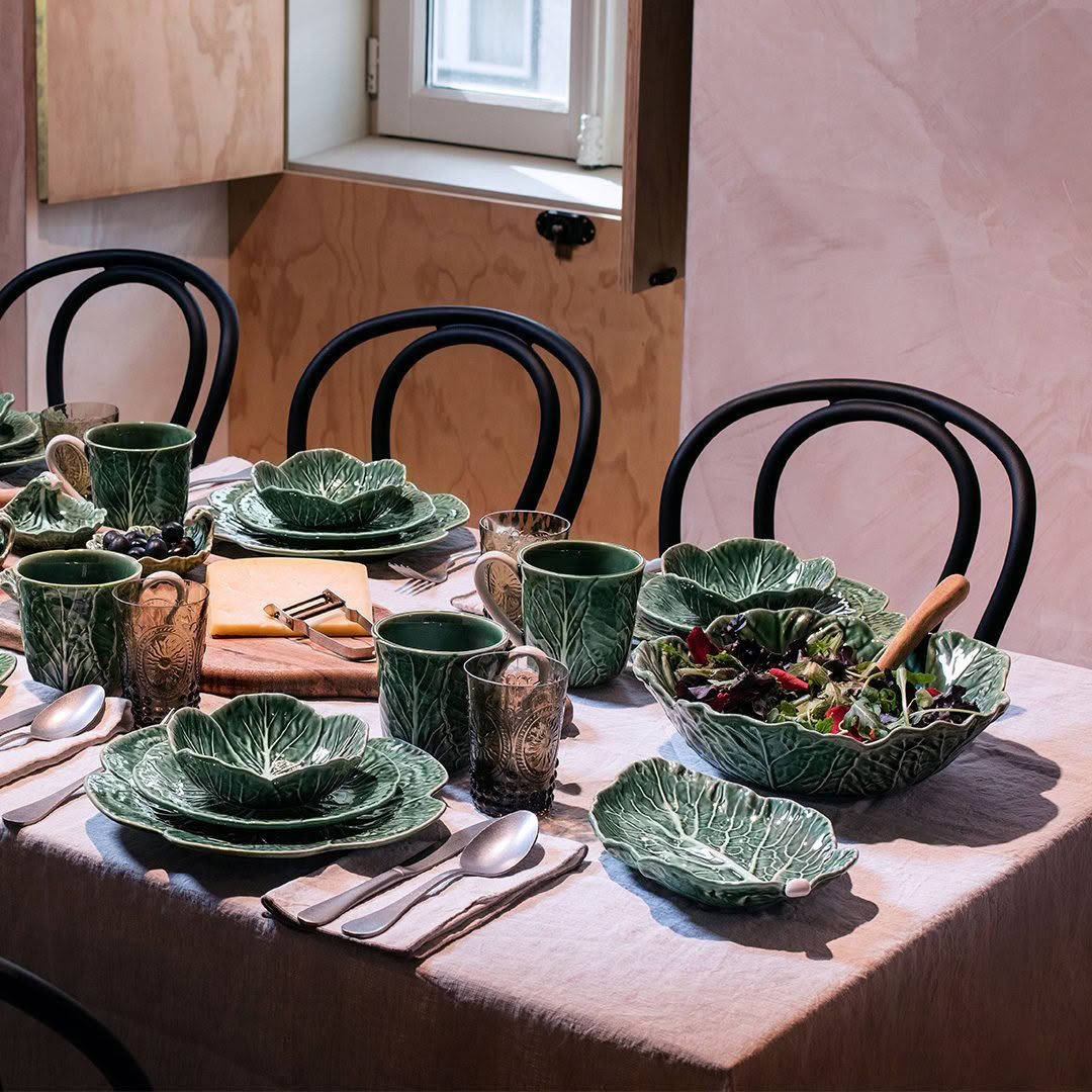 Leaf-themed dinnerware set on kitchen table
